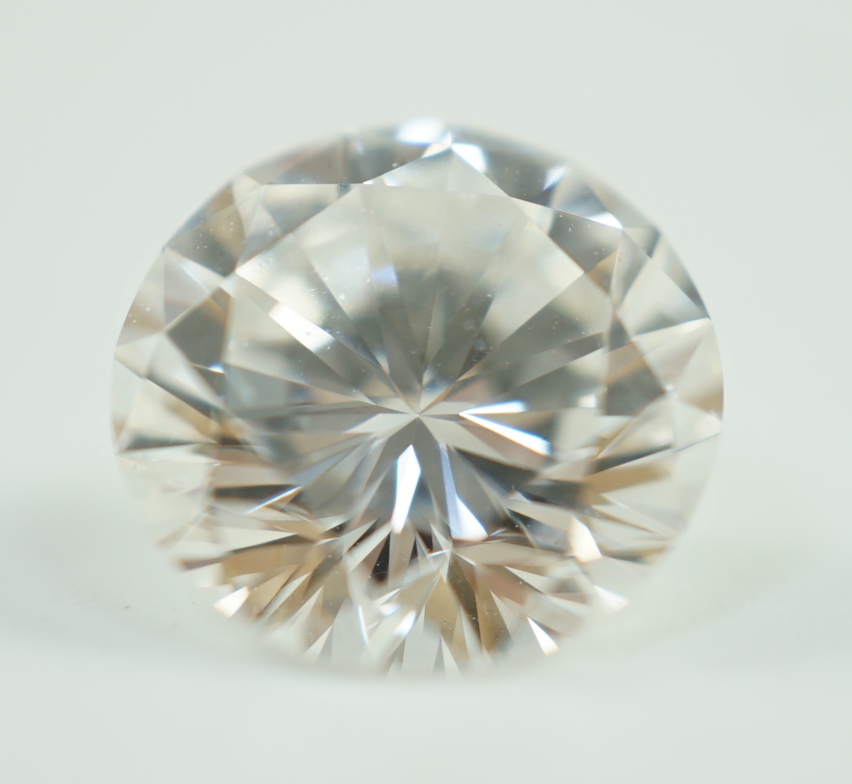 A white metal mounted round brilliant cut diamond, with GIA report dated 27/3/2023 stating the stone to weigh 2.45ct with a colour and clarity of F and SI1.